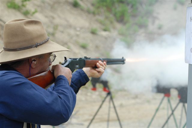 Black Canyon Pete with rifle.