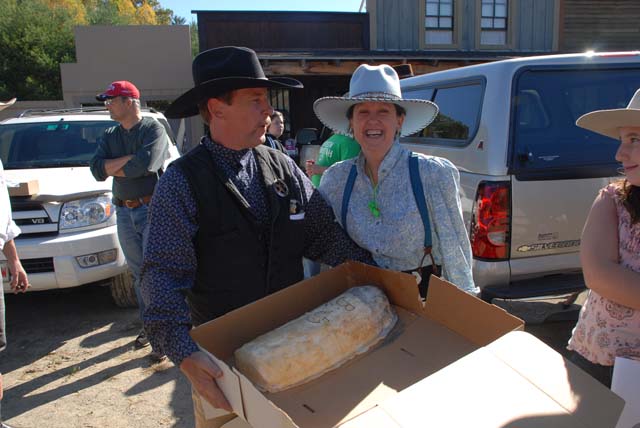 Hawley McCoy with the birthday cake shaped like a bullet.