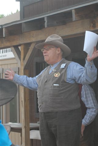 Barrister Bill making announcements at the Shooters Meeting.